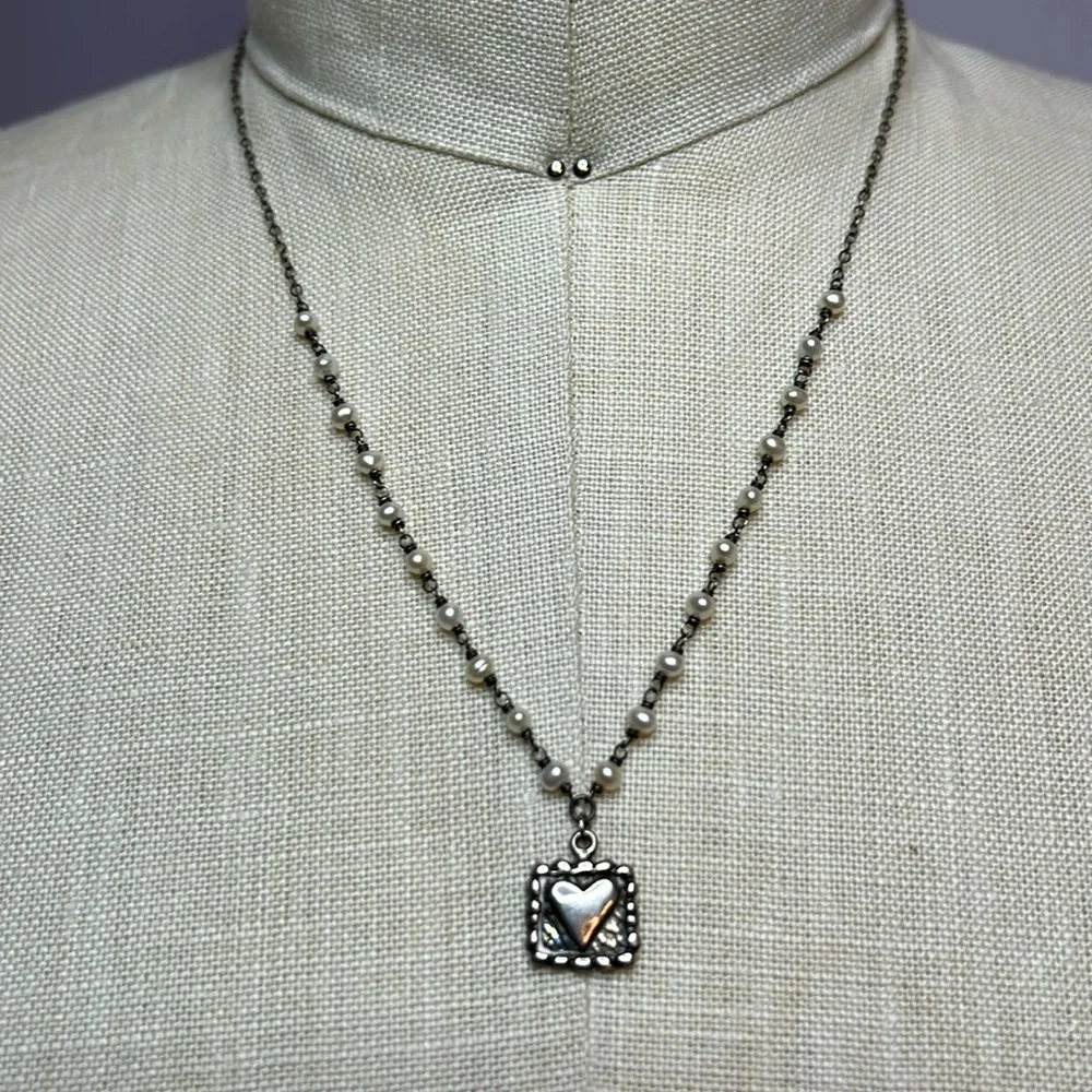 Silvertone heart charm dainty necklace with delicate white pearls on the chain